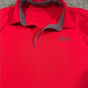Men’s red polo Under Armour shirt, size large.